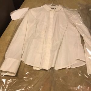 Dry cleaned ladies dress shirt. Sz.small